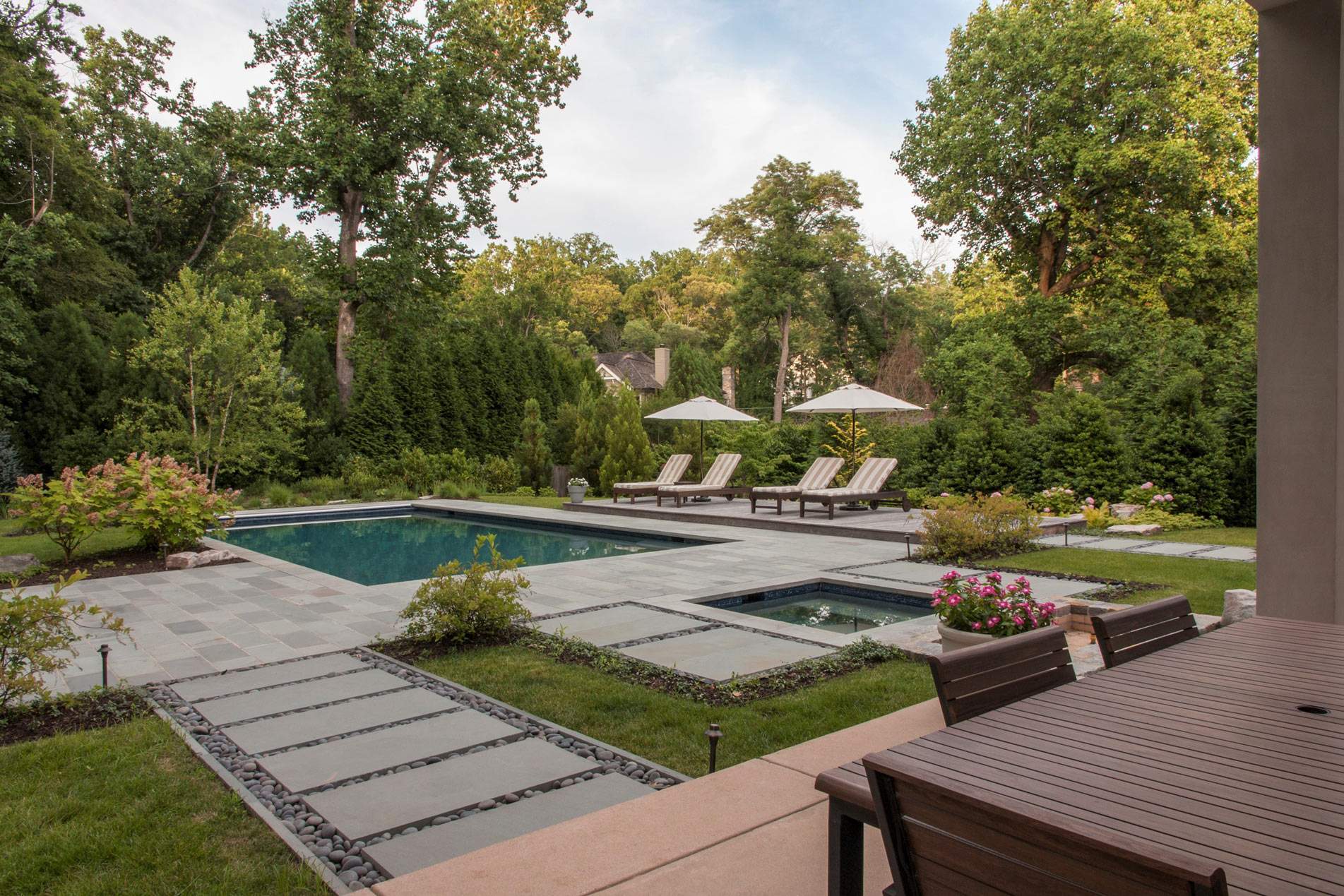 Backyard with Pool, Tile Path and Outdoor Seating
