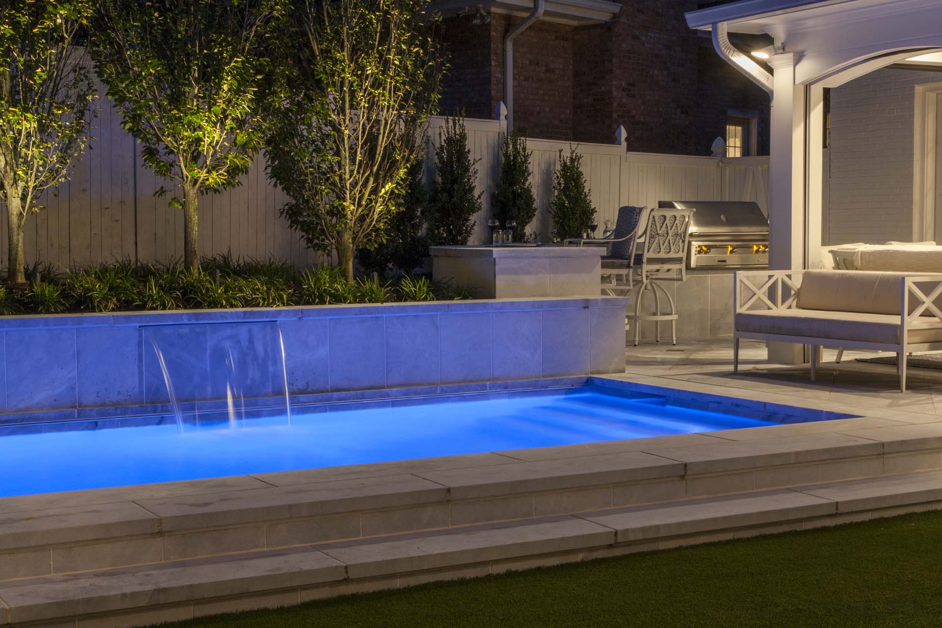 Outdoor Pool with Waterfall and Outdoor Seating