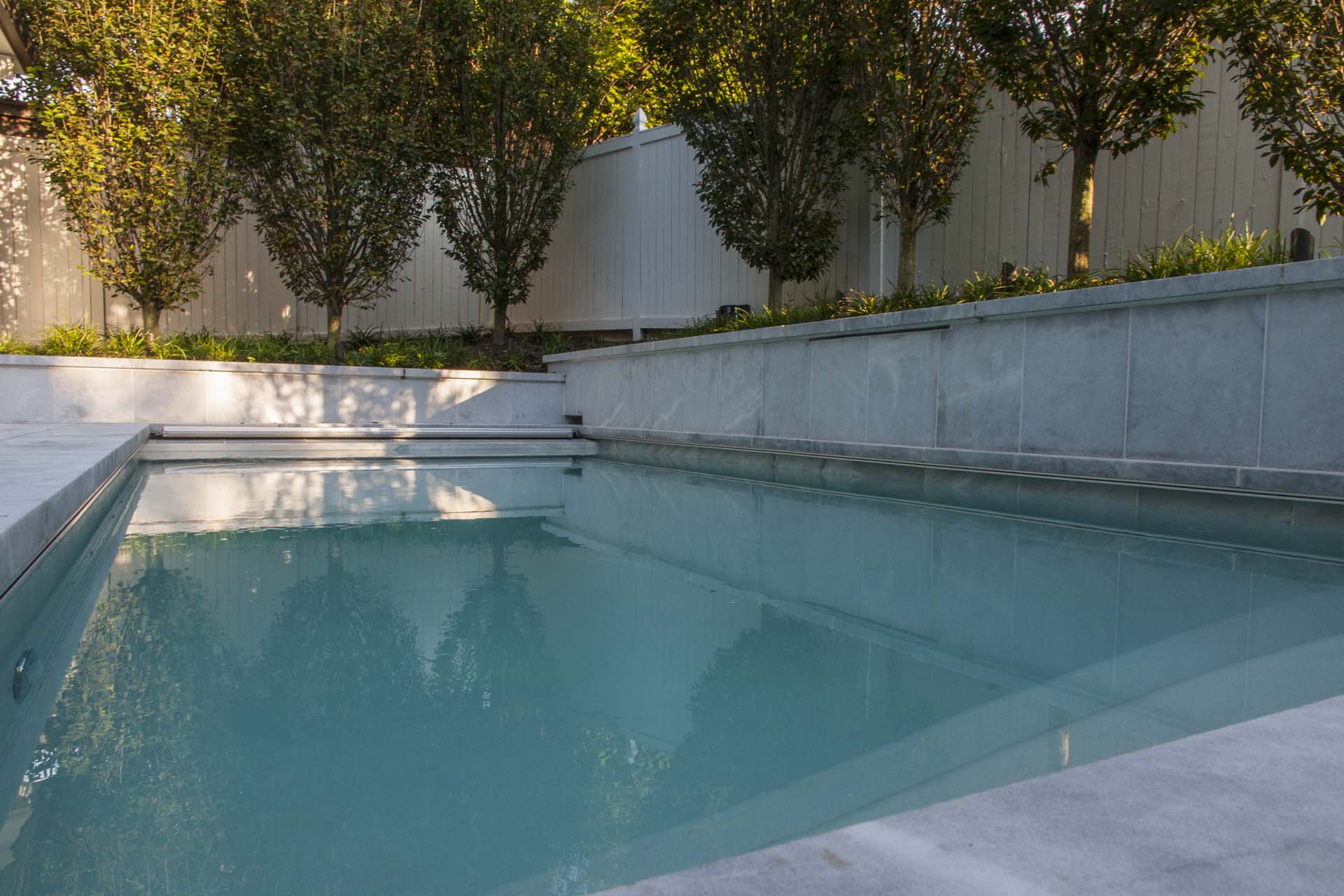 Pool in Backyard with Trees