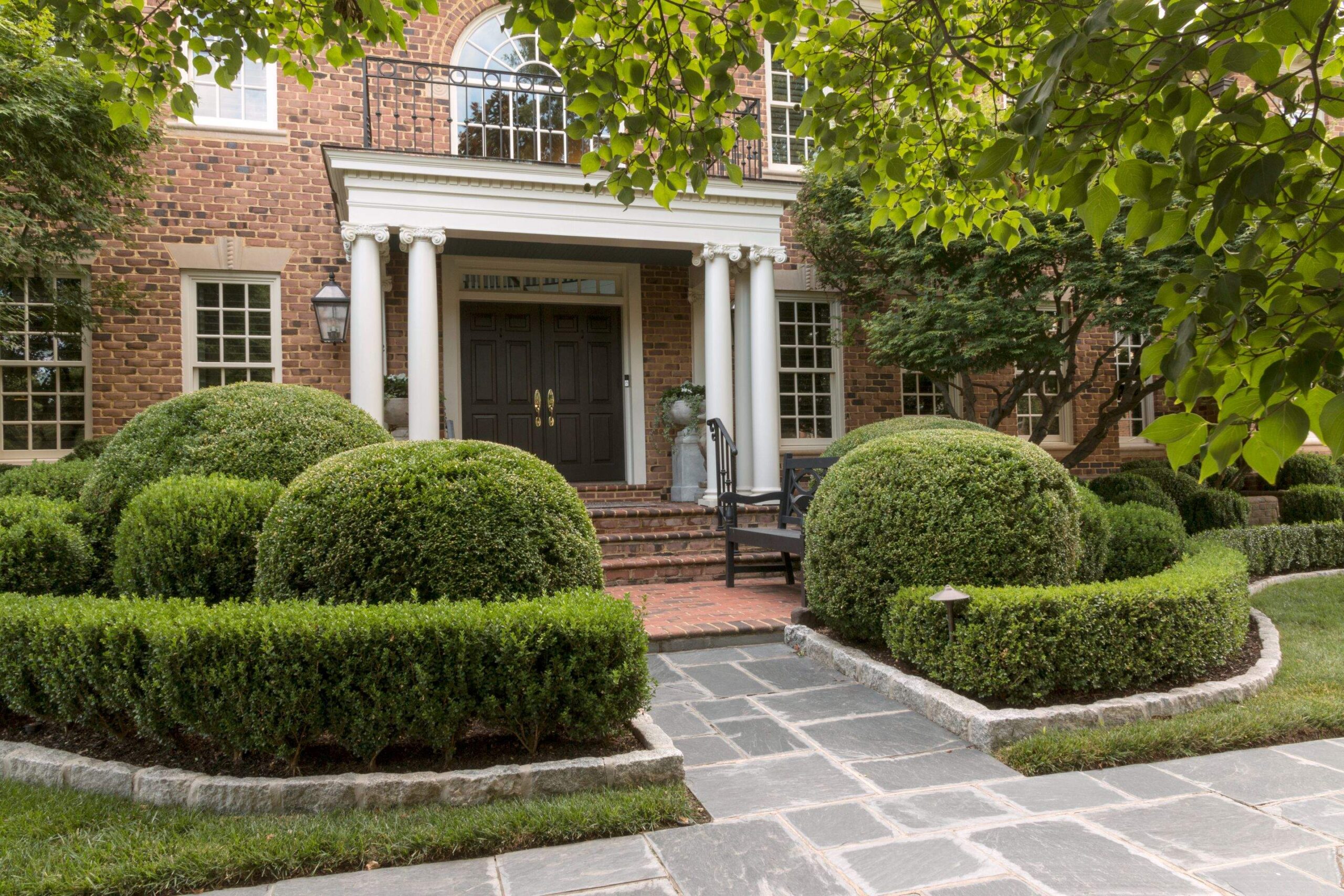 Front entrance with stone pathway